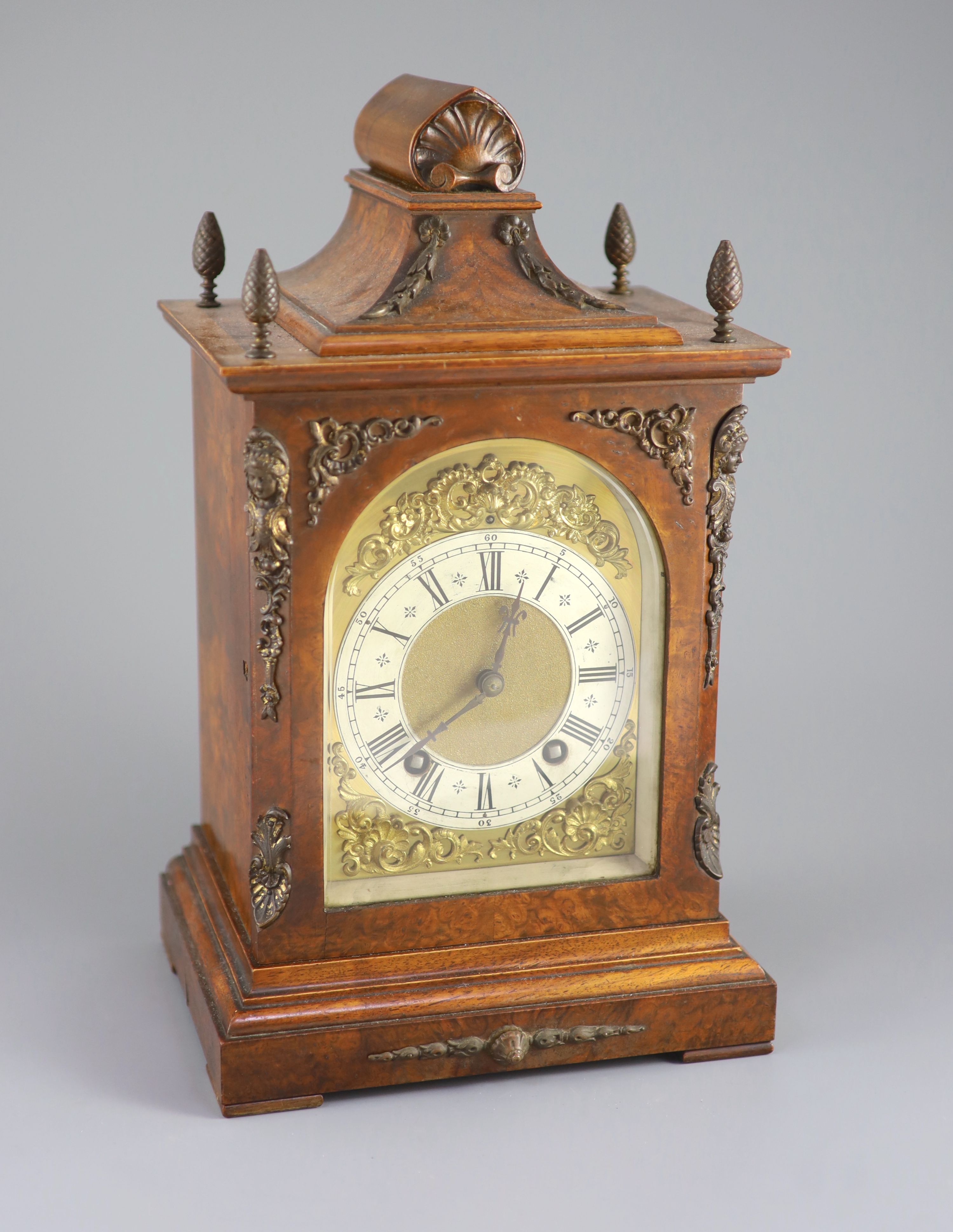 A late 19th century walnut cased bracket clock, 38cm high